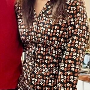 Black and orange vintage style long sleeve romper